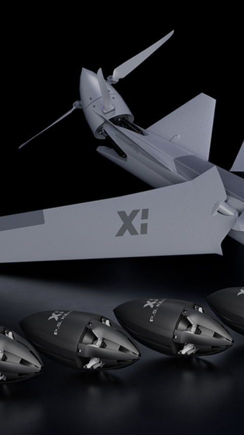 Football shaped drone and larger gray drone with wings